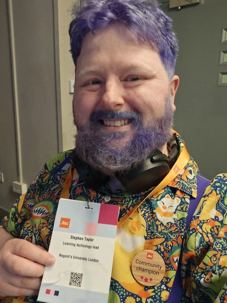 Photograph of me (Stephen Taylor) with my Digifest attendee lanyard and Jisc Community Champion badge on.